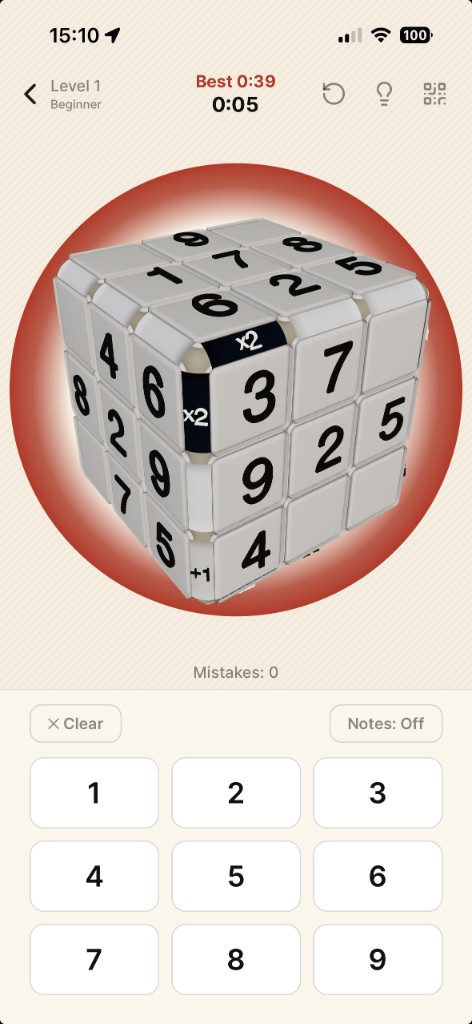 Puzzle play: 3D cube with numbered cells and Kropki markers, timer and best time, undo hint and share icons, number pad and notes